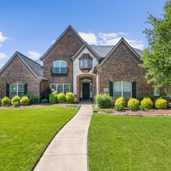BEAUTIFULLY LANDSCAPED STUNNING HOME