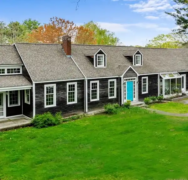 DISTINCTIVE HOME ON THE EDGE OF A SALT MARSH