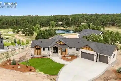 Exquisite Modern Retreat on Premier Pond-side 1-acre Lot
