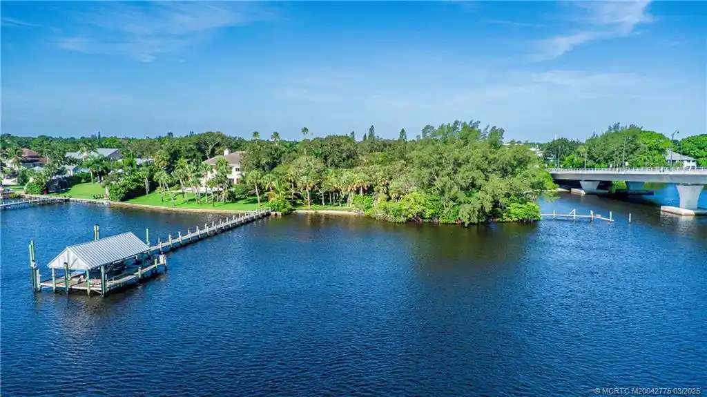 Rare Riverfront Property with Private Beach