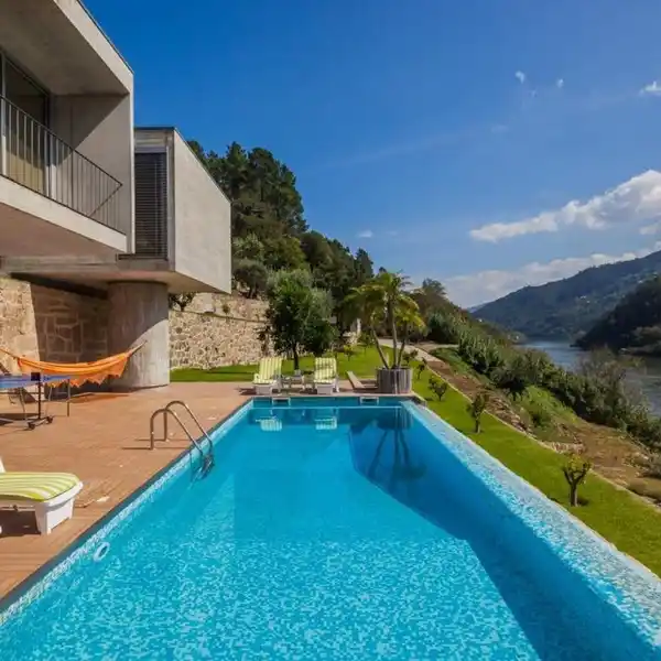 RIVERSIDE OPULENCE WITH HARMONIOUS ARCHITECTURAL DESIGN