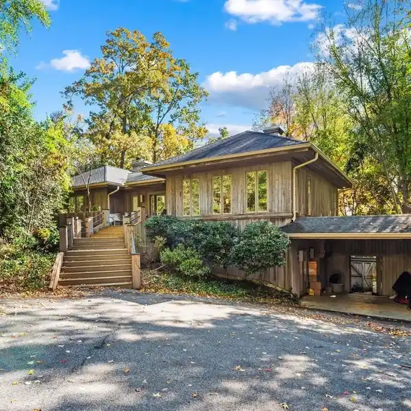 CURVED CABINETRY AND MARBLE FLOORS THROUGHOUT
