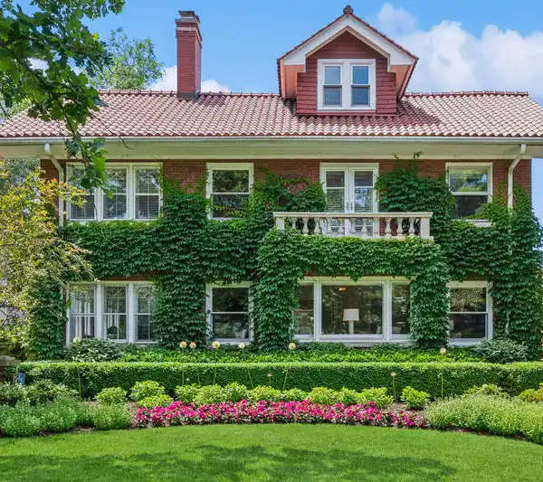 ELEGANT BRICK HOME STEPS FROM THE LAKE