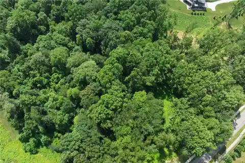 Luxury Living on 3 Wooded Acres Awaits