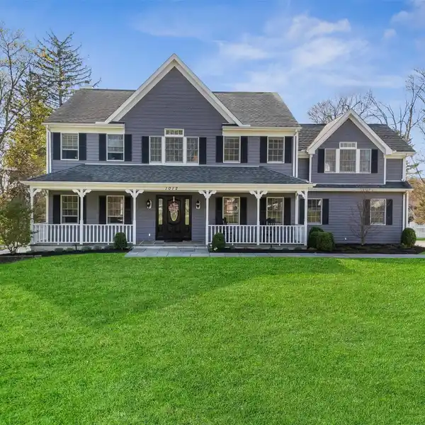 STUNNING COLONIAL WITH EXPANSIVE DECK