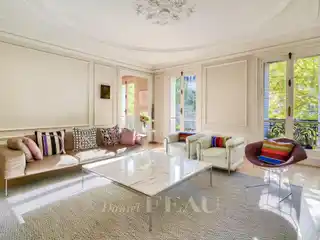 Sunlit Residence with Continuous Balcony Elegance