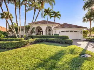 Beautifully Maintained Lakefront Pool Home