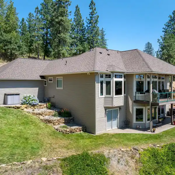 BEAUTIFULLY MAINTAINED CUSTOM HOME IN A GATED COMMUNITY