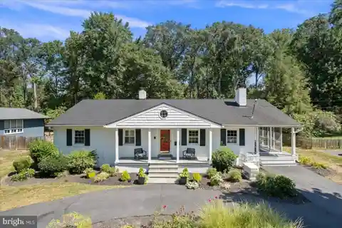 Turnkey Rambler with High-End Thermador Kitchen and Expansive Grounds