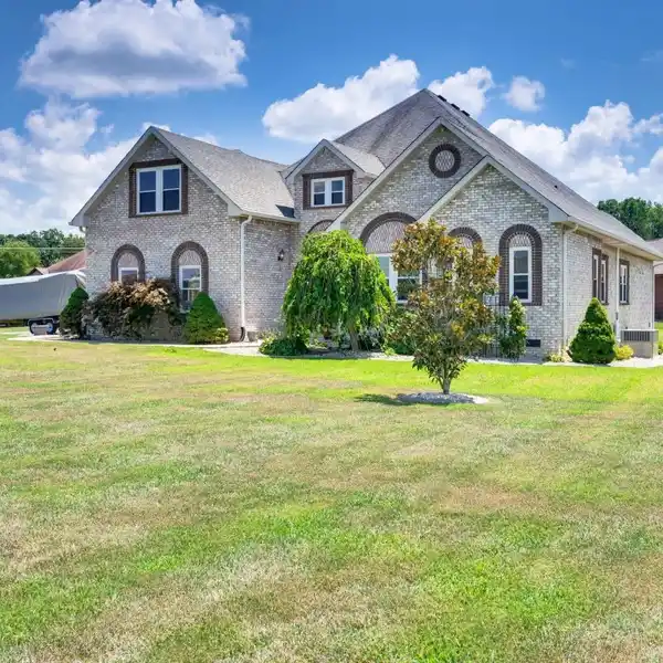 METICULOUSLY MAINTAINED ALL-BRICK CORNER LOT HOME