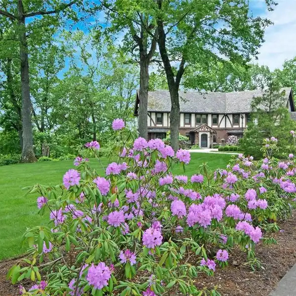CLASSIC TUDOR WITH TODAY'S FLOOR PLAN AND LIFESTYLE NEEDS