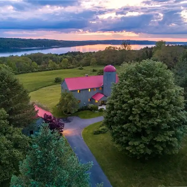 UNIQUE CUSTOM-BUILT HOME ON OVER 12 ACRES