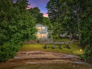 Rare Waterfront Home with Private Beach