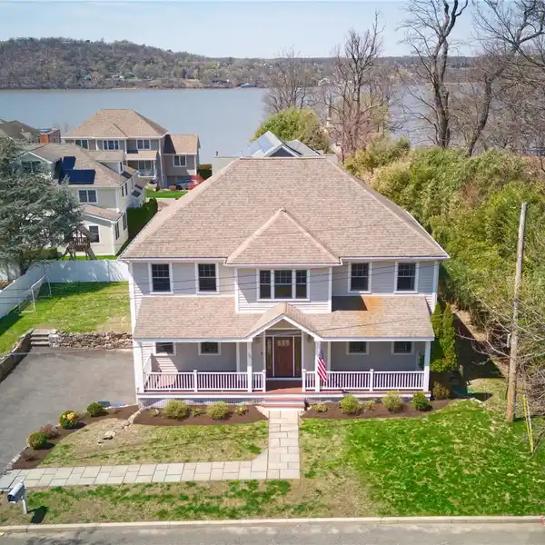BRIGHT CENTER HALL COLONIAL IN FABULOUS LOCATION