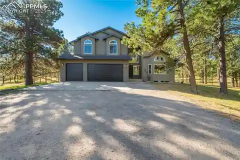 Elegant Home with Dual Fireplaces and Views