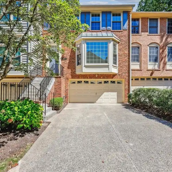 REFINED TOWNHOME WITH DESIGNER TOUCHES THROUGHOUT