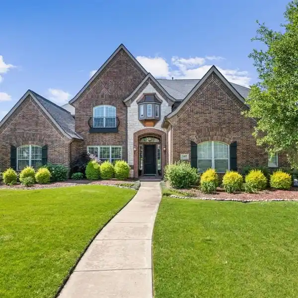 BEAUTIFULLY LANDSCAPED STUNNING HOME
