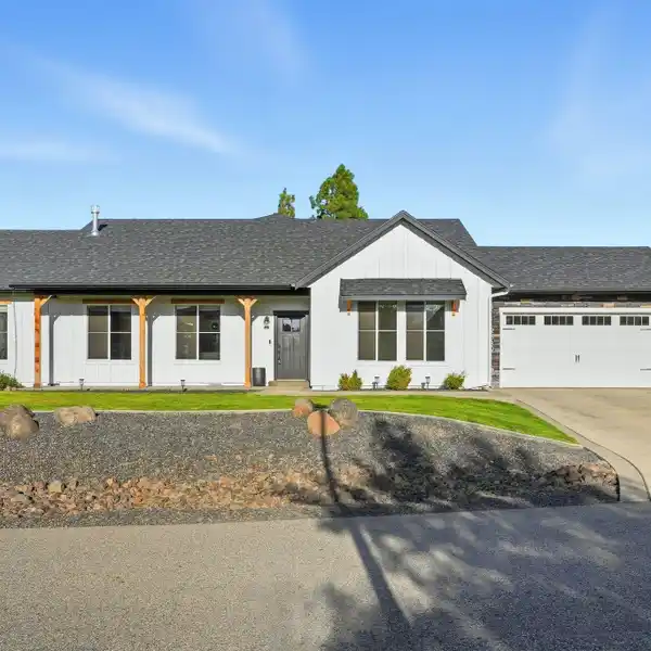 MODERN FARMHOUSE IN LUXURIOUS GATED COMMUNITY