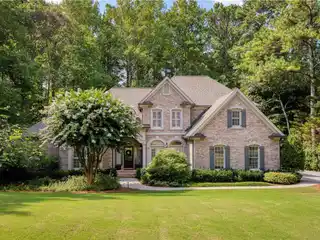 Timeless White Columns Home with Scenic Porch