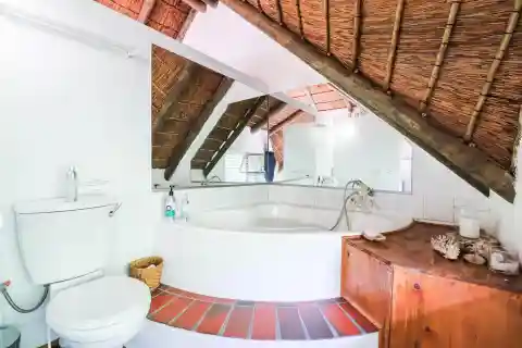 Charming Thatched-Roof House