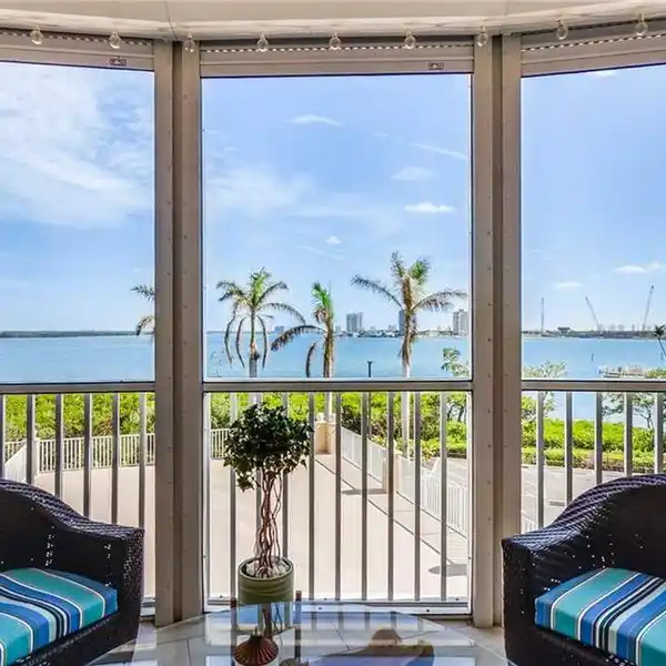 CORNER UNIT WITH SPECTACULAR PANORAMIC WATER VIEWS