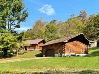 Picturesque Log Home on 90 Acres