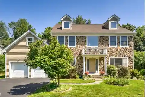 Beautifully Maintained Younger Colonial Home