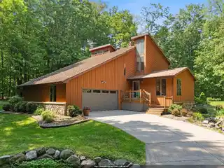 Meticulously Cared for Home on a Wooded Retreat