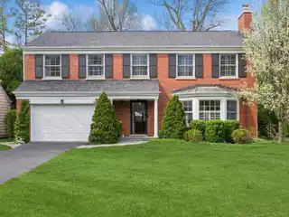 Beautifully Maintained Red Brick Home