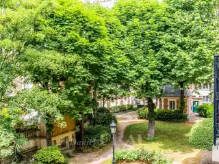 Elegant Paris Apartment Overlooking Private Garden