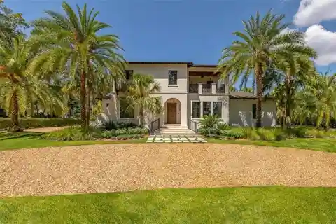 Mizner Inspired Home in Gated Hawkins Island