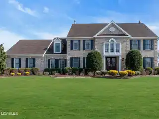 Elegant Custom Colonial Home in Ideal Willowbrook Community