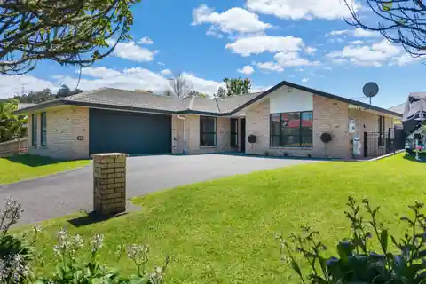 Spacious Brick Home with Sunlit Private Backyard