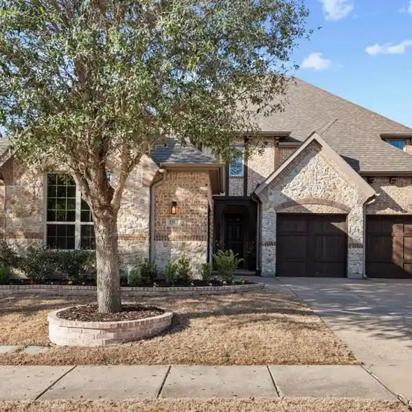 METICULOUSLY DESIGNED HOME IN AN EXCLUSIVE GATED COMMUNITY