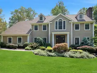 Elegant Colonial Living with Grand Architectural Presence