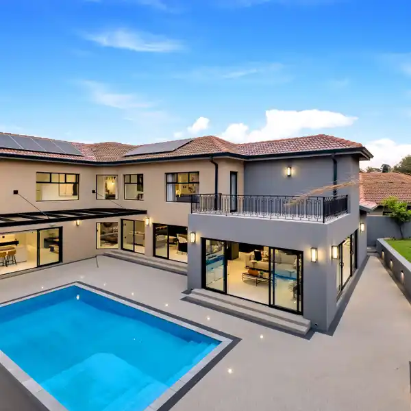 EXCEPTIONAL DESIGNER HOME WITH PANORAMIC GOLF COURSE VIEWS