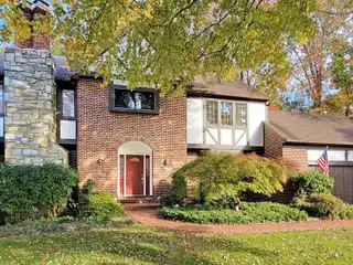 Stylish Wet Bar, Recreation Room, and Multiple Living Areas