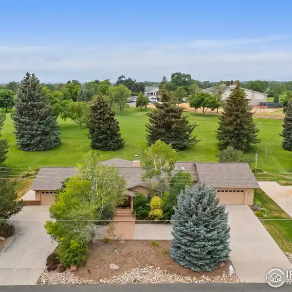 CUSTOM RANCH HOME ON THE FT. COLLINS COUNTRY CLUB GOLF COURSE