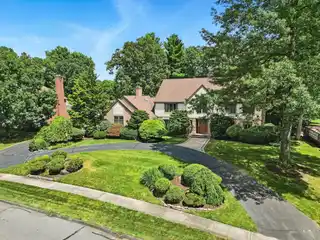 Premier Neighborhood Gem with Custom Chef’s Kitchen