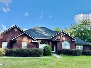 Meticulously Maintained Single-story Brick Home on 20 Acres