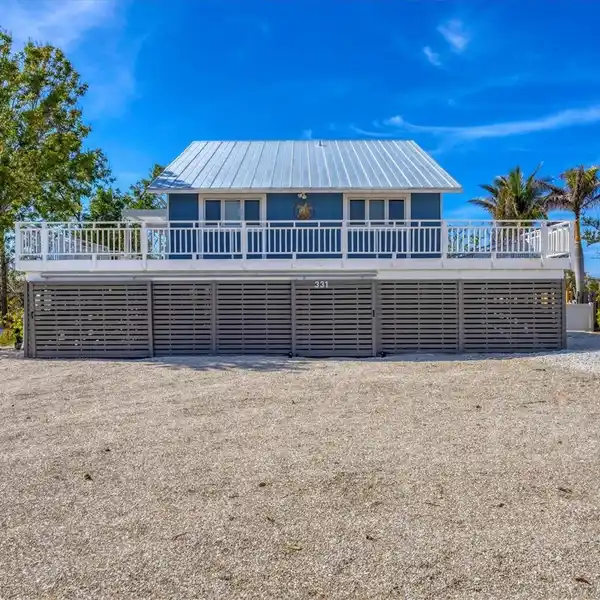 KEY WEST STYLE WATERFRONT HOME ON PALM ISLAND