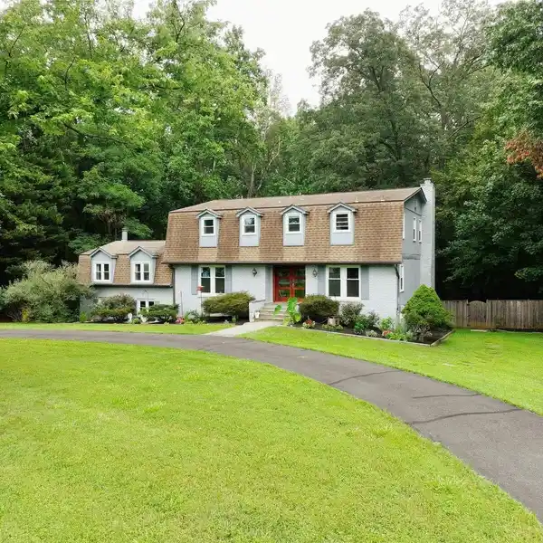 ELEGANT DINING AND LIVING AREAS WITH HARDWOOD FLOORS