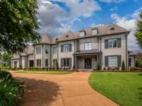 GORGEOUS GATED HOME ON OVER TWO ACRES