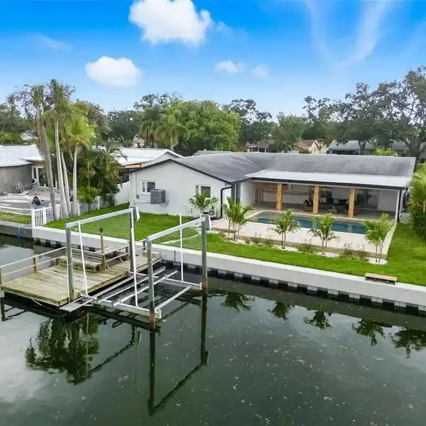 MAGNIFICENT MOVE-IN READY WATERFRONT POOL HOME