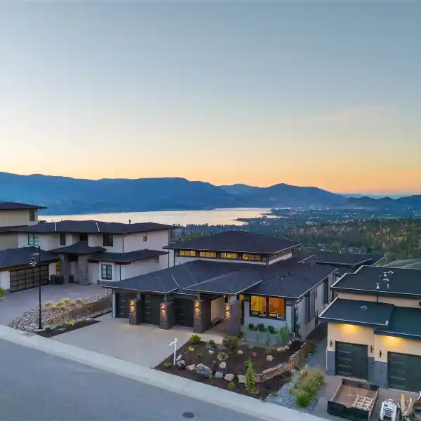 LUXURIOUS CUSTOM HOME WITH STUNNING LAKE VIEWS