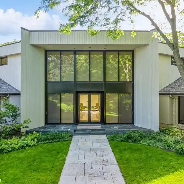 STRIKING CONTEMPORARY LAKEFRONT HOME ON OVER TWO ACRES
