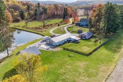Unique Estate of Natural Beauty with Private Pond and Barn