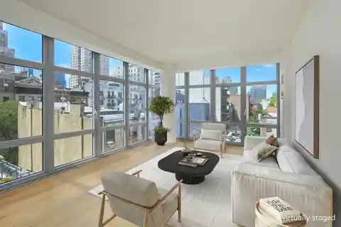 Sun-Filled Corner Residence at the Link Condominium