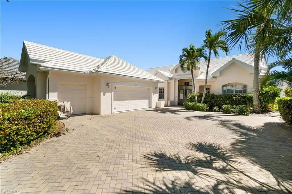 Immaculately Maintained Home with Sweeping Golf and Lake Views