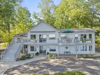 Lakefront Elegance with Docks, Beach, and Views